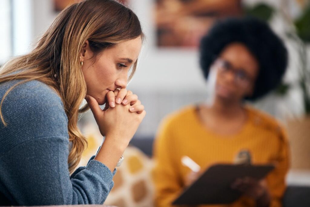 a woman participates in cognitive behavioral therapy in flint michigan