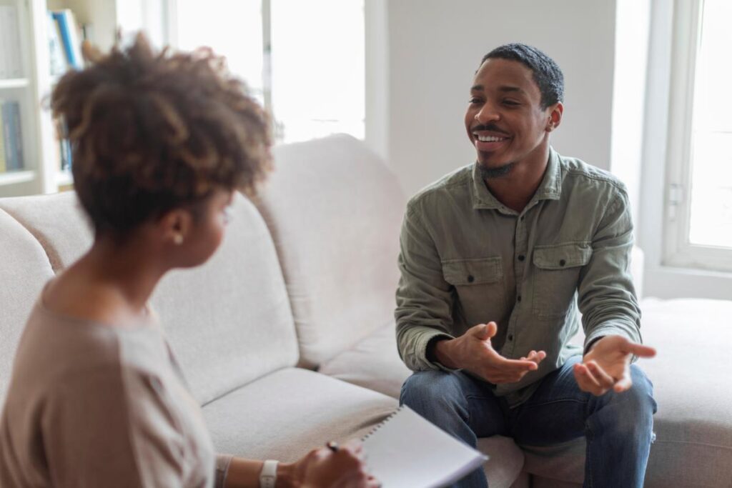 a man opens up in therapy for anxiety treatment