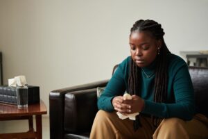 a young woman opens up in therapy for depression treatment