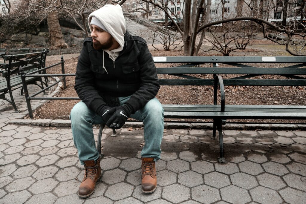 man sitting on bench